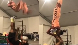 Astounding moment acrobat flips his partner through air with just his feet
