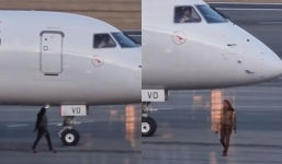 Woman arrested after allegedly running onto the tarmac at airport