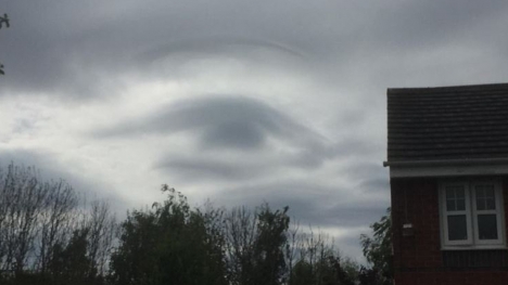 Father stunned after capturing the bizarre moment when a massive eye formed in the clouds
