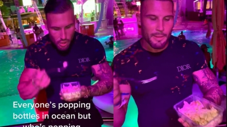Gym-mad influencer criticized for bringing 'meal prep' to nightclub 