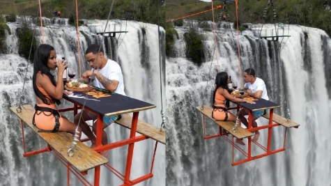 Adventurous couple enjoyed their meal on picnic table suspended 295 feet in the air, leaving people captivated