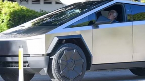 Jay Leno looks tiny as he appears in LA in his MASSIVE Tesla Cybertruck after car fire accident 