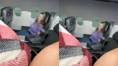 Woman duct-taped aboard American Airlines flight after trying to open the door mid flight