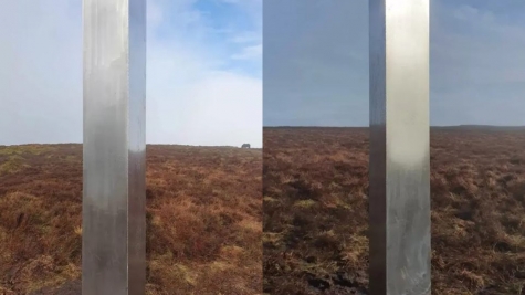  Locals are baffled after spotting a 10-foot mysterious metal monolith on remote hill