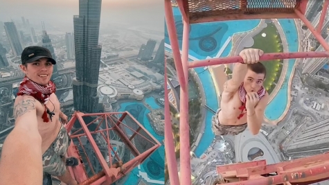 Free climber scales 1,280ft crane in Dubai only realizes it's covered in grease