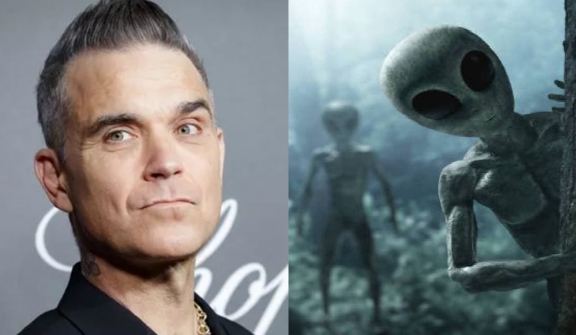 Robbie Williams states aliens are looking for him due to the fame and benefits from him