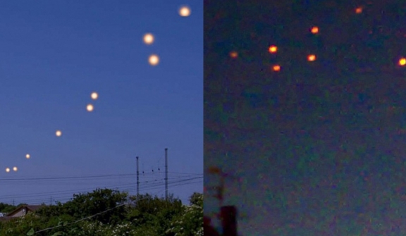 Onlookers baffled after witnessing numerous bizarre orange UFOs floating in the sky