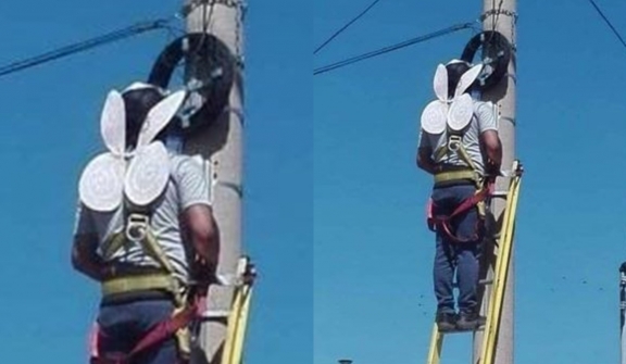 A heartwarming picture: dad wears wings made by daughter to keep him safe