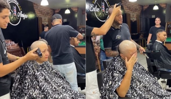 Internet in tears as barber shaves head in support of mother's cancer battle