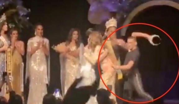 Angered husband rushes to snatch crown after wife wins miss Brazil runner-up