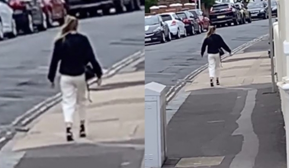 Millions freak out over woman who appears frozen in time while walking down the street