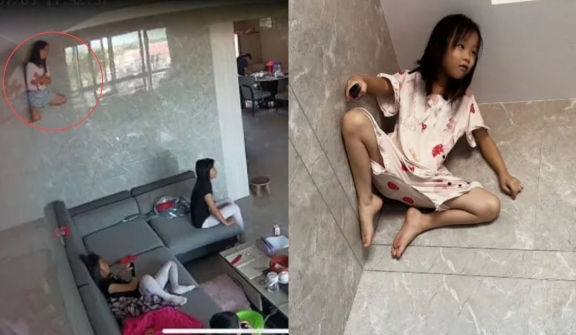 Mom spots her daughter 'stuck' to the walls while watching TV