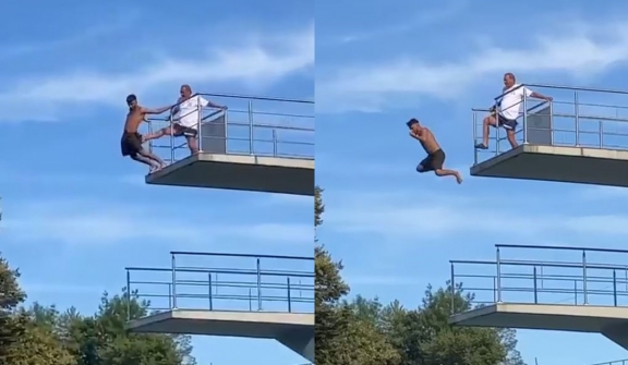 Lifeguard kicks boy off a 10m high dive board after he refuses to come down