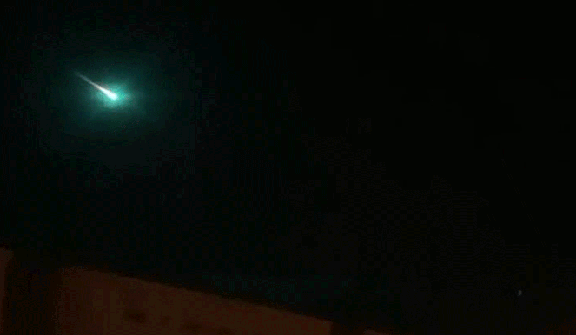 Incredible moment as mysterious green glow appears across the night sky