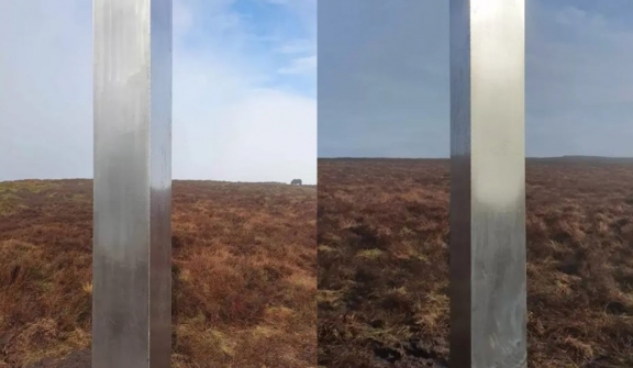  Locals are baffled after spotting a 10-foot mysterious metal monolith on remote hill