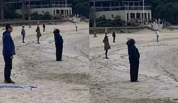 Viewers stunned after witnessing group of people apparently stuck in a trance on beach 