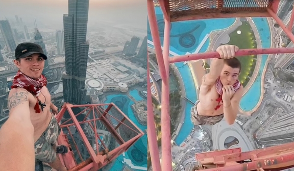 Free climber scales 1,280ft crane in Dubai only realizes it's covered in grease