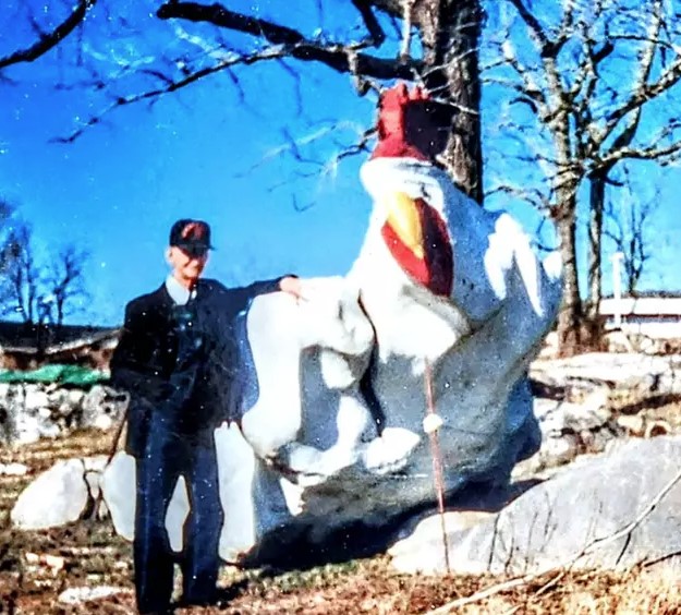 Leonard and the rooster at the initial period of The Rock Zoo. Image Credit: Alabama Rock Zoo/Supplied.