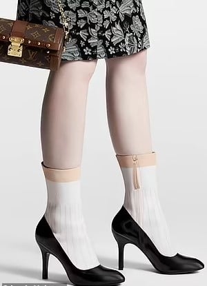 $2.5K Louis Vuitton boots spark intense debate as they look like real human legs 3