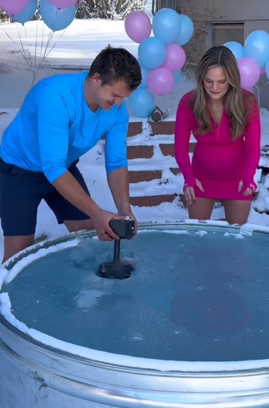 American couple sparks debate after jumping into ice bath in the middle of winter for unique gender reveal 1