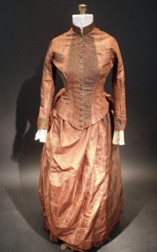 Experts reveal answer to mysterious codes hidden in 19th-century silk dress for more than 100 years 1