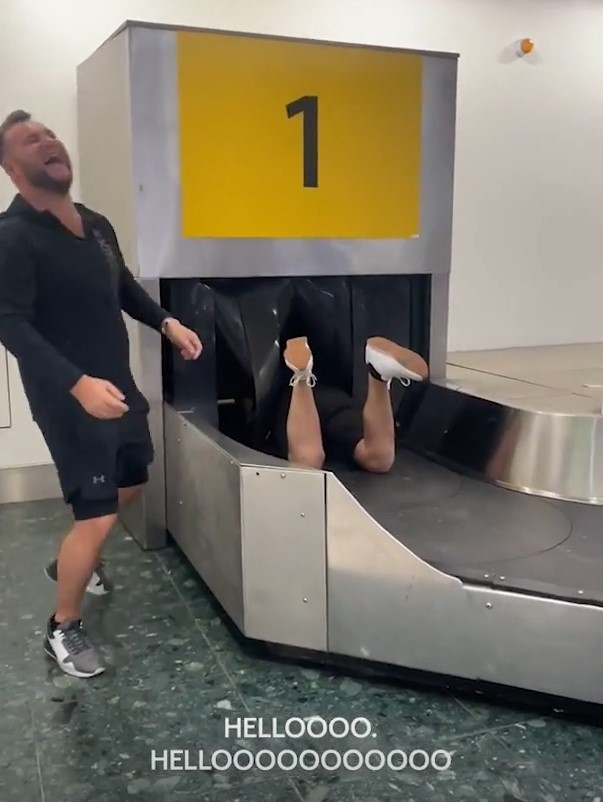 Traveler sparks debate after taking ride on baggage carousel and stating to poop on it for waiting luggage too long 3