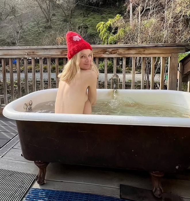 Mulvaney celebrated her updated passport by sharing a topless photo on Instagram. Image Credit: Instagram