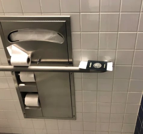 Unfortunate situation when someone left their passport in the bathroom.