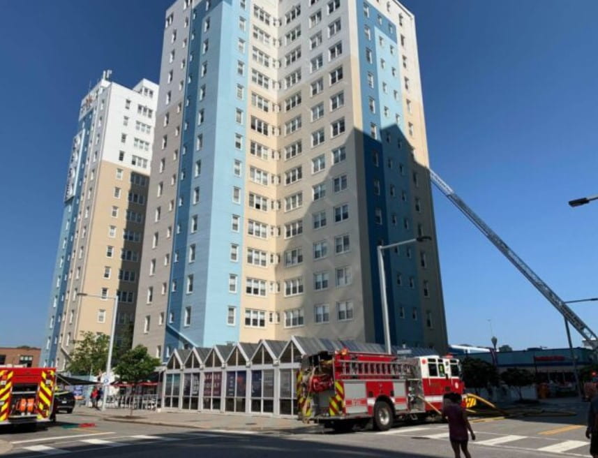 Heroic firefighter rescue fainted Husky stuck on 15th floor of burning building 1