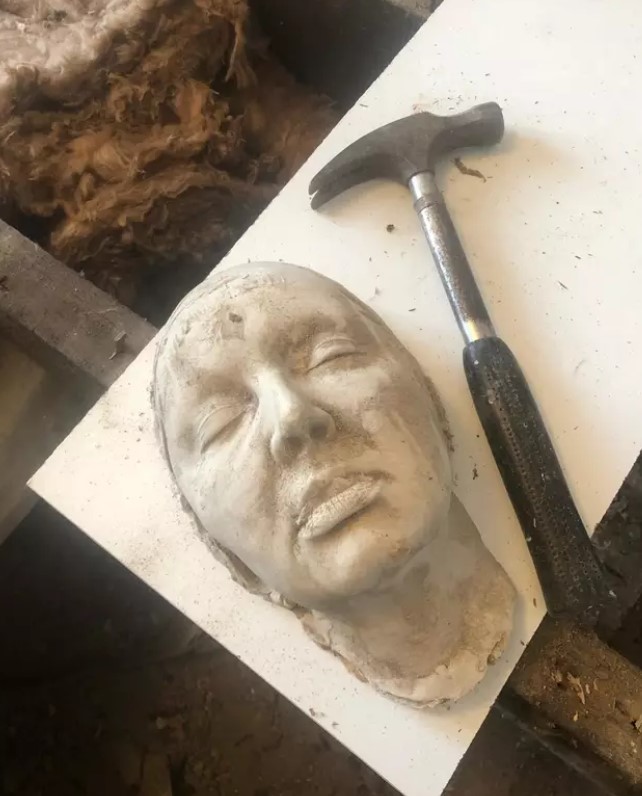 Couple left stunned after finding 'human mask' hidden under their house's floorboards 2