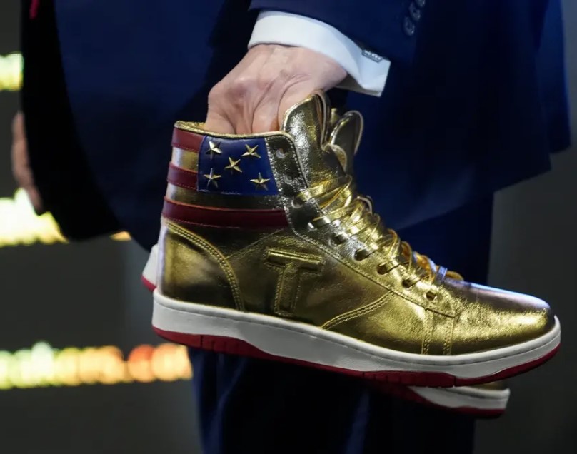Man successfully bids for signed golden Donald Trump sneakers for $9K 3