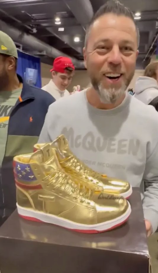 Man successfully bids for signed golden Donald Trump sneakers for $9K 2