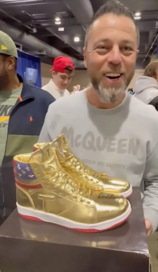 Russian CEO Roman Sharf won the autographed golden Donald Trump sneakers. Image Credit: X