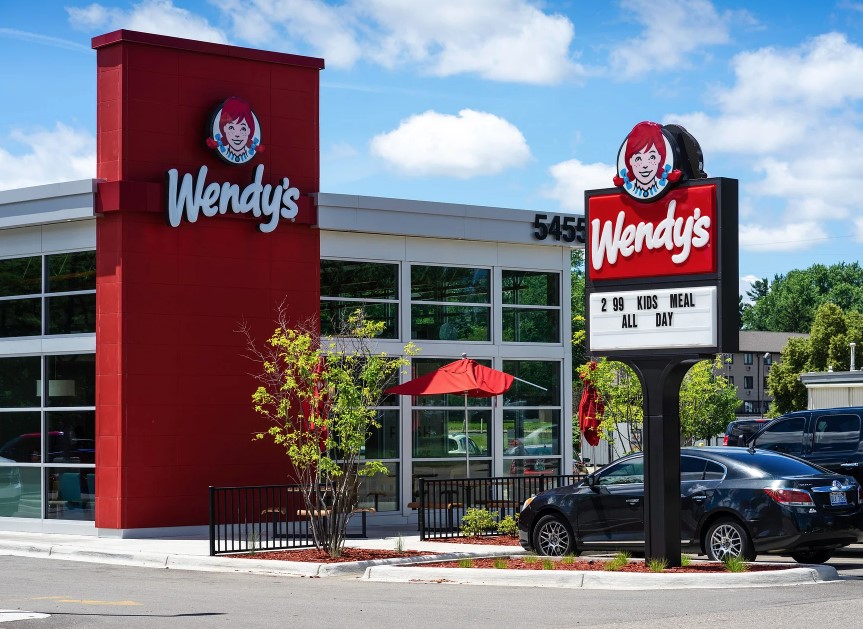 Wendy's is criticized for its new price increase policy. Image Credit: Getty