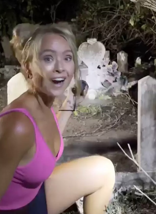 Woman sparks debate after deciding to clean random stranger's gravestone at midnight 1