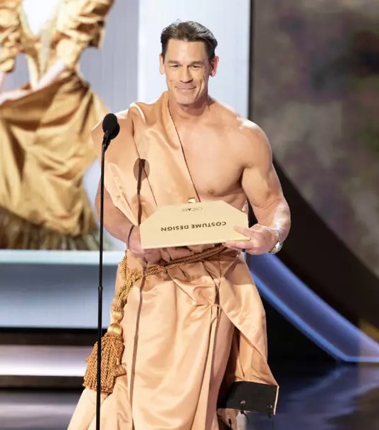 He finally wore a toga made from an Oscars stage curtain. Image Credit: Getty