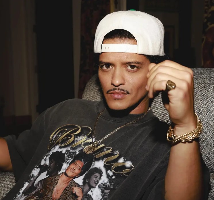 Bruno Mars' current deal with MGM earns him $90 million, and he used to play poker to pay rent. Image Credit: Getty