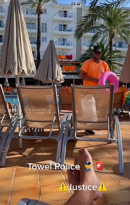 Staff remove belongings from occupied pool loungers at resort 3