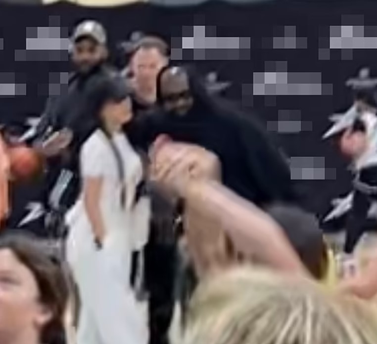 Kanye West and his ex-wife Kim Kardashian were seen hugging each other at their son's basketball game in LA 1