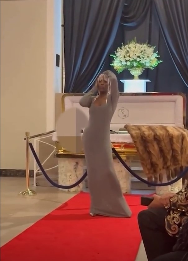 Model sparks curiosity after confidently walking down runway at open-casket funeral 5