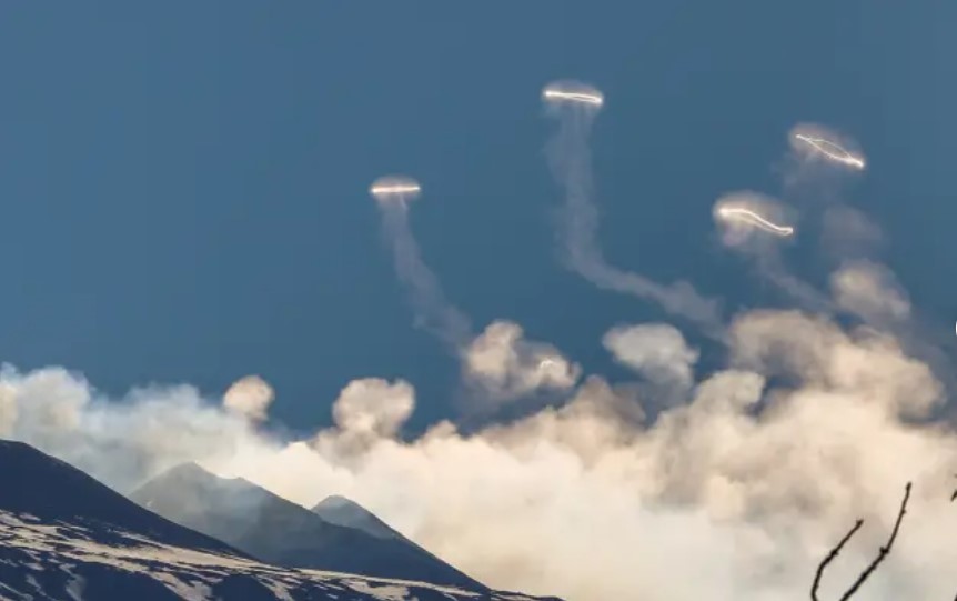 Mount Etna captivates tourists after blowing ‘smoke rings’ into sky in ultra-rare phenomenon 3