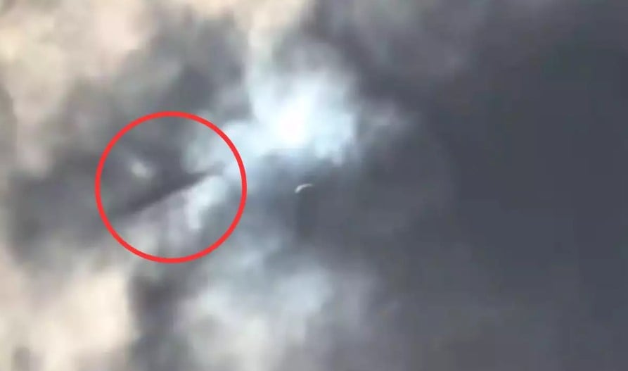 UFO spotted flying across clouds over Texas sky during total solar eclipse 2