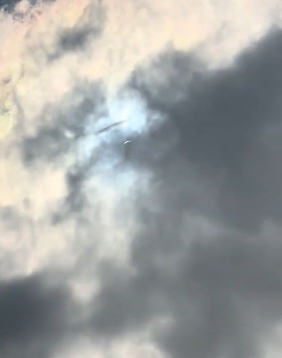 UFO spotted flying across clouds over Texas sky during total solar eclipse 1