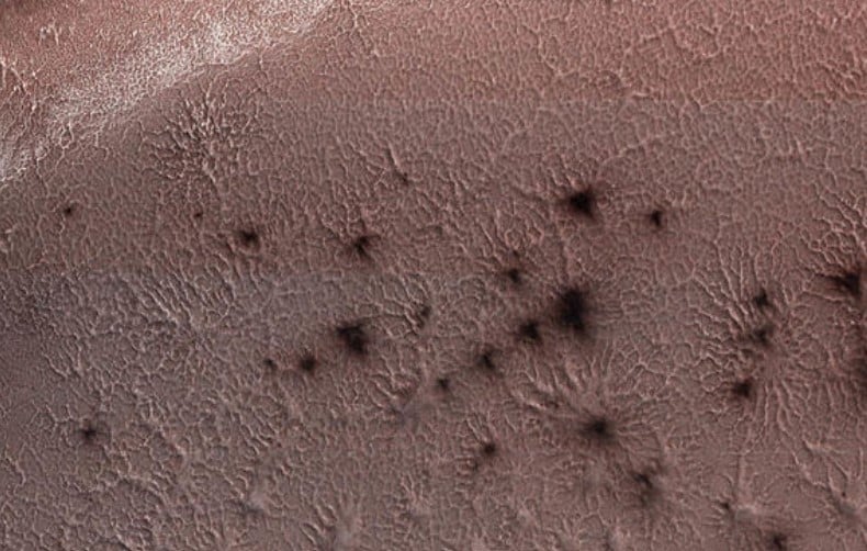 European Space Agency's spacecraft captures mysterious spider on Mars 3