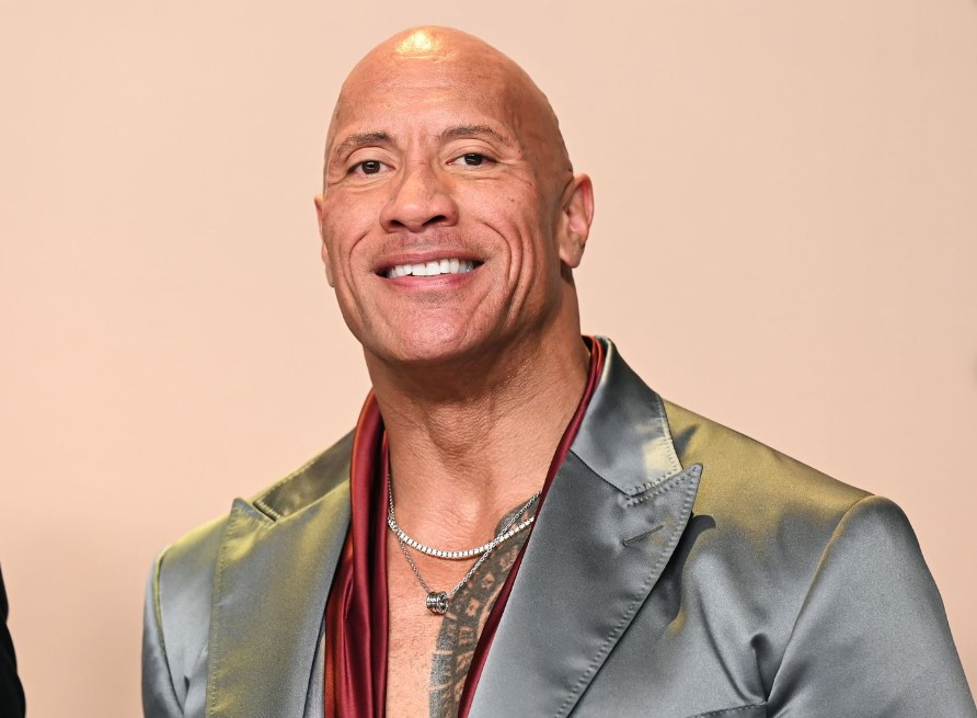 Rumors circulated that Dwayne Johnson is facing a $50 million lawsuit for causing significant costs by arriving late to a film shoot. Image Credit: Getty