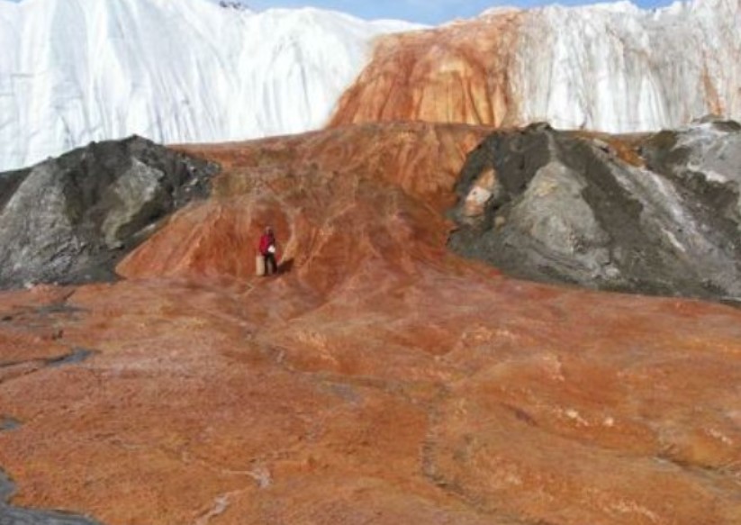 Initially clear, water from Blood Falls turns red due to oxidation from oxygen and iron-rich minerals. Image Credit: Getty