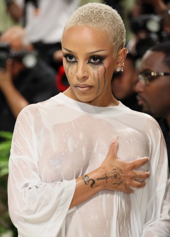 Fans urge Doja Cat's removal from Met Gala due to her controversial wet T-shirt Image Credit: Getty