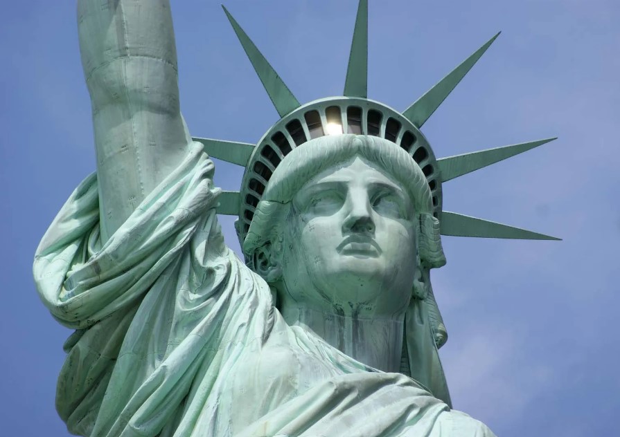 A man has gained internet fame for putting a replica of the Statue of Liberty on his house's roof. Image Credit: Getty