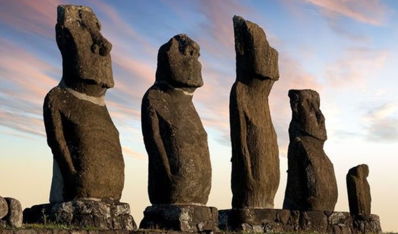 Statues strategically positioned near freshwater sources for island's water supply. Image Credit: Getty