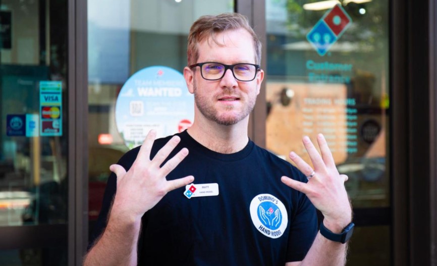 Domino's selected Matt Strain, a Queensland teacher, as their professional hand model. Image Credit: 9News